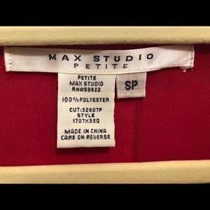 Red draped blouse with tie on bottom